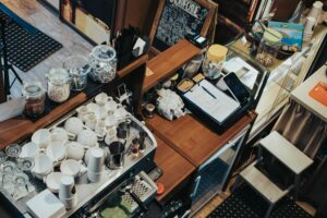 behind the counter of coffee shop